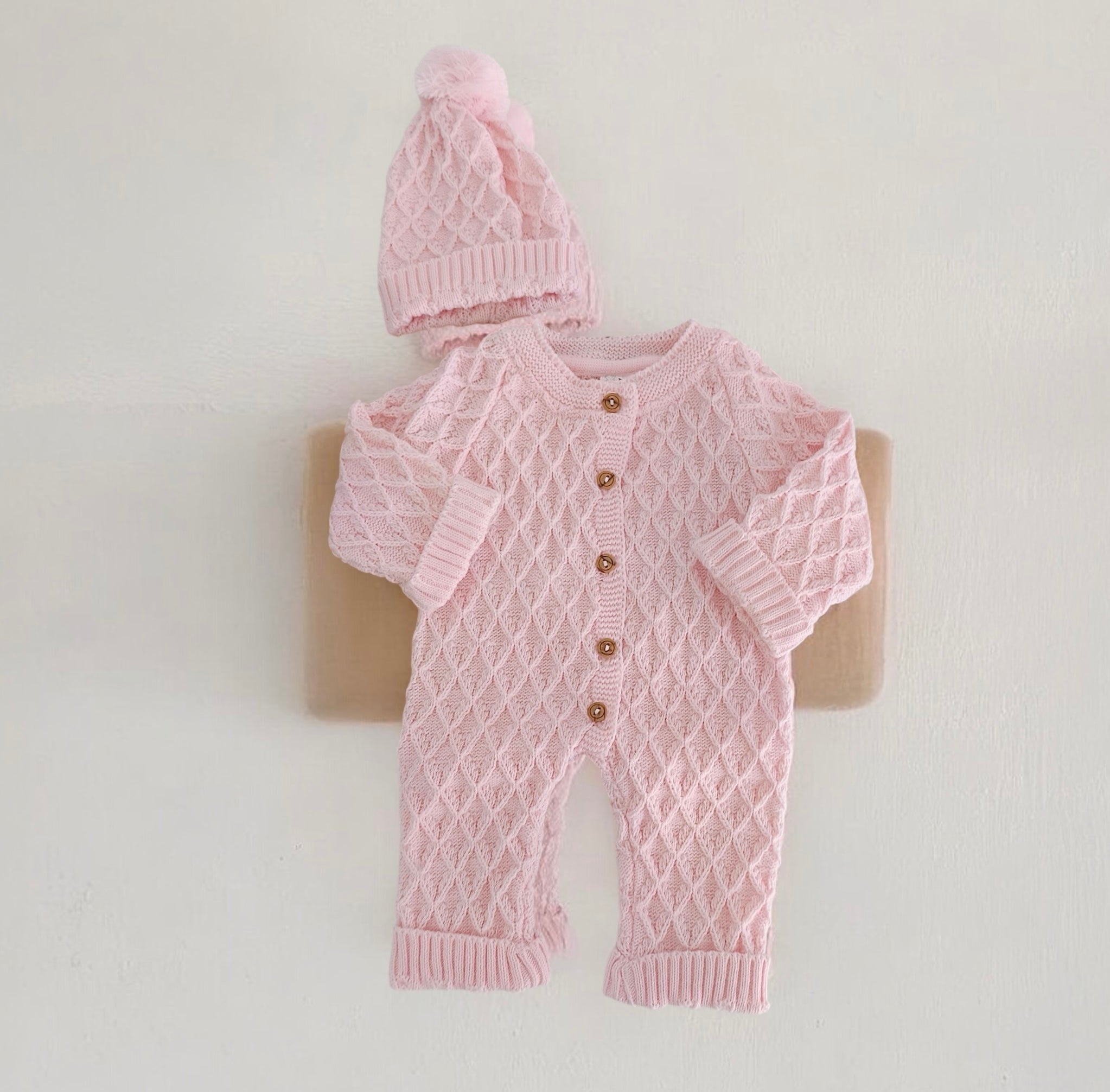 Babygrow de malha Losangos com gorro Rosa